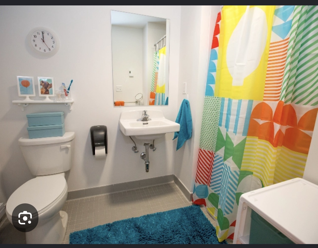 Private en-suite dorm bathroom with sink, shower and toilet
